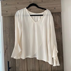 Size medium, ruffle sleeve, split back, creme colored ACOA blouse.